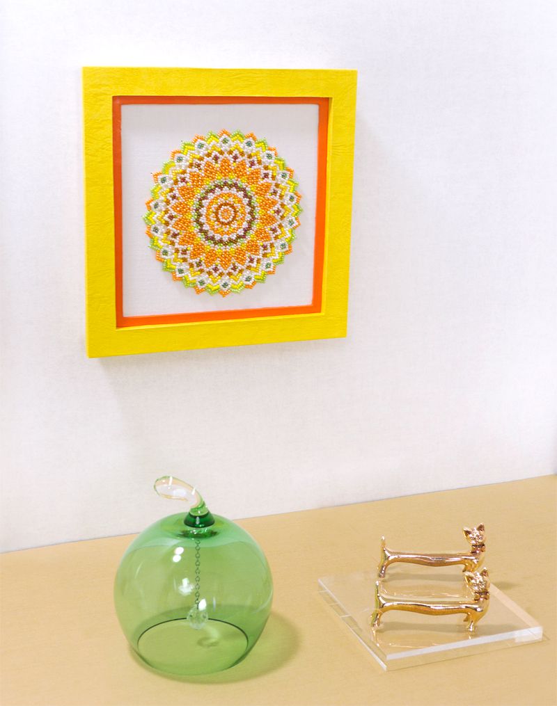 Orange Gazania Flower Doily put on a picture frame