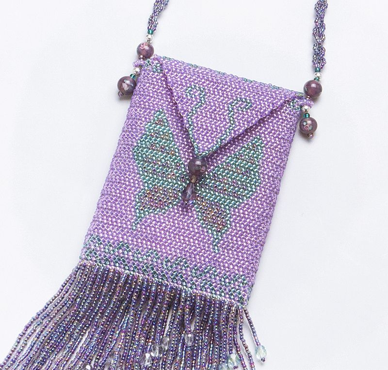 detail of purple butterfly beaded amulet bag