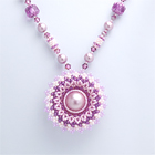 circular flowery pendant necklace