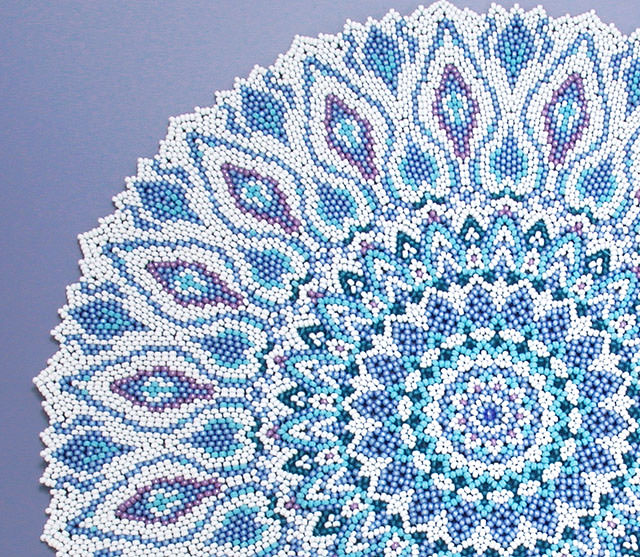 Detail of Blue beaded doily like a Turkish plate