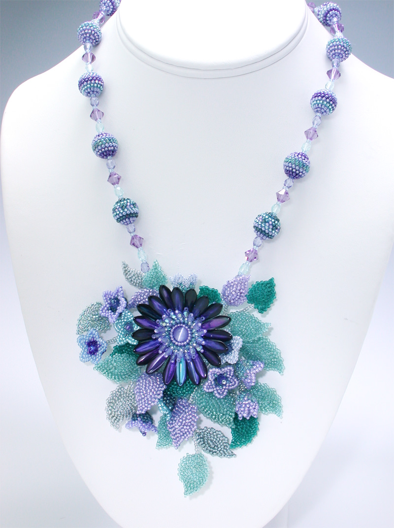 Blue Flower corsage necklace on the necklace display